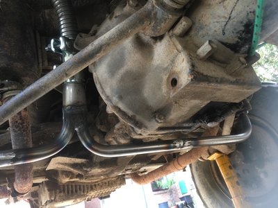 Exhaust pipes under the engine