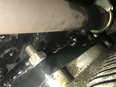 Here is a photo of the weld line and crack right alongside. I am sure I haven’t hit anything major in the few drives I have donehad, and oil I am sure is coming from crack. Engine oil level hasn’t dropped so thinking it is transmission oil. I have had engine out 4 or 5 times recently, including replacing clutch where I reckon I may have damaged seal. Haven’t had time to remove exhaust to see how much oil is in clutch housing.<br /><br /><br />Will try send another photo of crack on other side of housing.